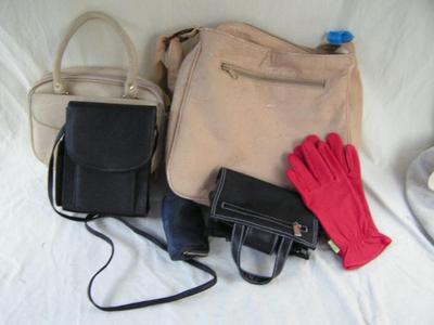 Handbags and purses and a pair of red leather gloves