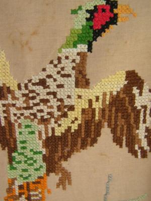 Pair of cross stitch wall decor, each about 24" tall x 10" wide