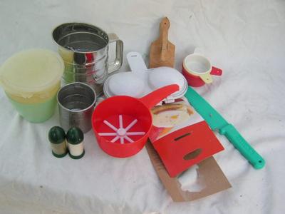 Lot of kitchen gadgetry & Tupperware.