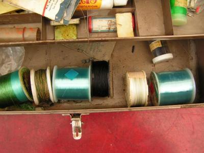 Tackle box with lots of fishing gear. Solid stamped steel