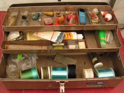 Tackle box with lots of fishing gear. Solid stamped steel