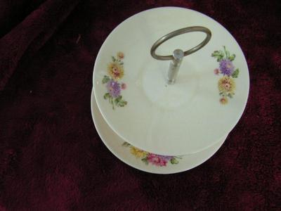 Vintage small 2 tier snack server, unknown origins. Ceramic. No box.
