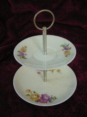 Vintage small 2 tier snack server, unknown origins. Ceramic. No box.