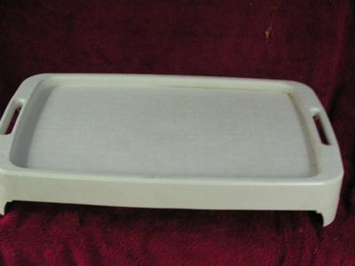 Folding bed tray/table. Breakfast in bed anyone. Plastic construction.