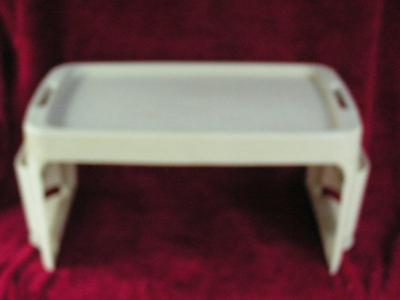 Folding bed tray/table. Breakfast in bed anyone. Plastic construction.