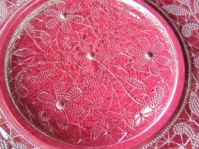 Clear glass sandwich/salad plate Poesy pattern w/ footed bottom.