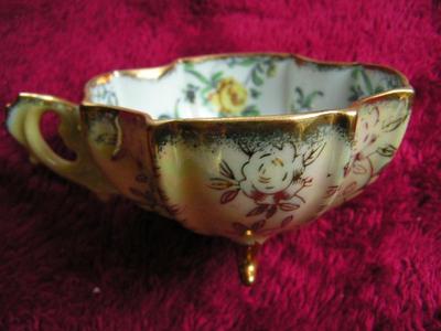 Vintage Napco of Japan Lusterware porcelain 3-footed teacup and saucer