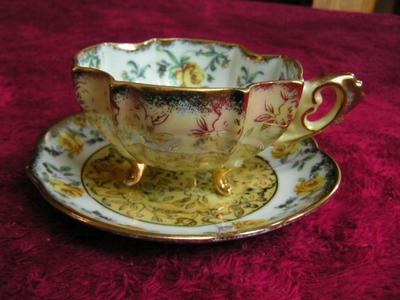 Vintage Napco of Japan Lusterware porcelain 3-footed teacup and saucer