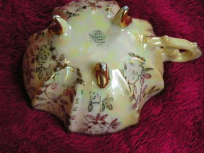 Vintage Napco of Japan Lusterware porcelain 3-footed teacup and saucer