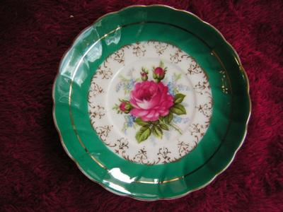 Vintage porcelain (Japan?) 3-footed teacup and saucer set