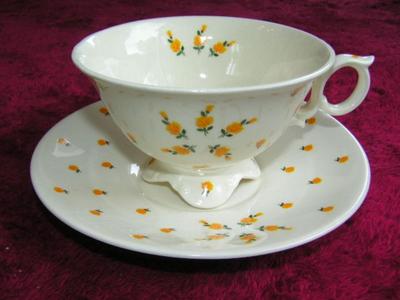 Arabia Monica teacup & saucer set. Tiny yellow roses