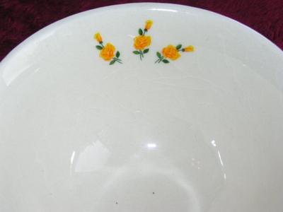 Arabia Monica teacup & saucer set. Tiny yellow roses