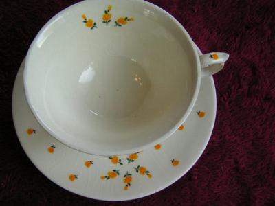 Arabia Monica teacup & saucer set. Tiny yellow roses