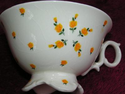 Arabia Monica teacup & saucer set. Tiny yellow roses