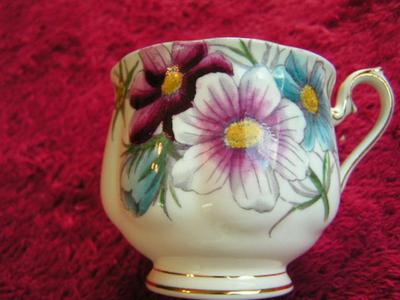 Vintage “Royal Albert” bone china (porcelain) teacup & saucer set.