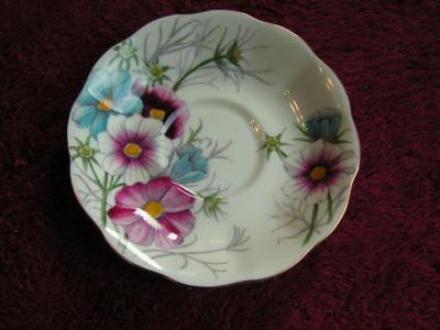 Vintage “Royal Albert” bone china (porcelain) teacup & saucer set.