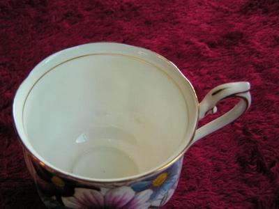 Vintage “Royal Albert” bone china (porcelain) teacup & saucer set.
