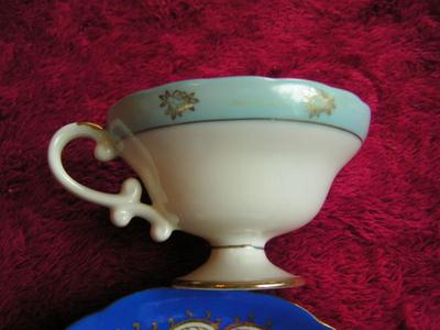 Vintage porcelain teacup & saucer set.