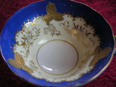 Vintage porcelain teacup & saucer set.