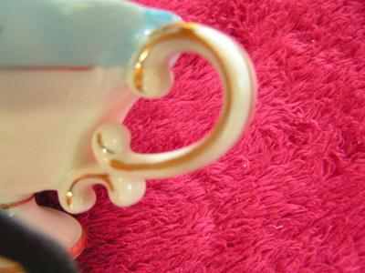 Vintage porcelain teacup & saucer set.