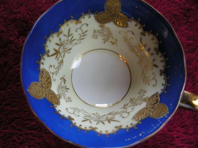 Vintage porcelain teacup & saucer set.