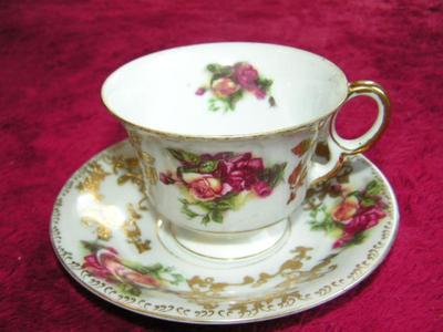 Vintage Royal Sealy China, Japan. Lusterware porcelain footed teacup w/saucer