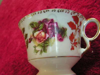 Vintage Royal Sealy China, Japan. Lusterware porcelain footed teacup w/saucer