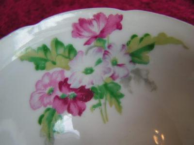 Vintage Ucagco of Japan porcelain teacup & saucer set.