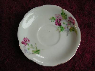 Vintage Ucagco of Japan porcelain teacup & saucer set.