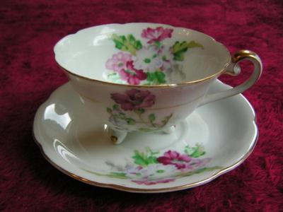 Vintage Ucagco of Japan porcelain teacup & saucer set.