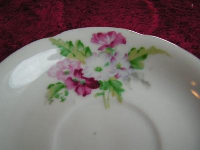 Vintage Ucagco of Japan porcelain teacup & saucer set.