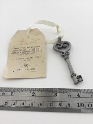 Faith key charm