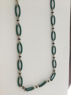Gold tone green fashion T marked necklace