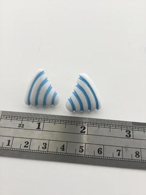 Avon. Marked white and blue stripe earrings