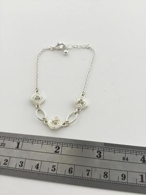 Silver tone adjustable fashion bracelet