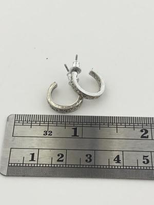 Unmarked silver tone small hoop earrings