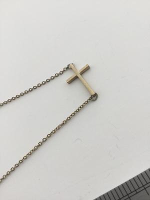 Gold tone cross necklace