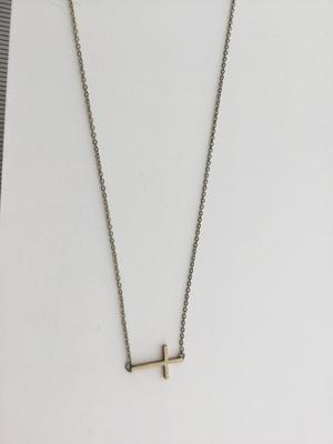 Gold tone cross necklace