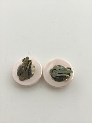 Light pink round clip on earrings