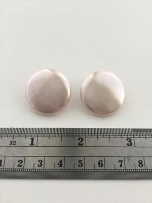 Light pink round clip on earrings