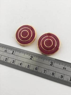 Gold tone red round clip on earrings