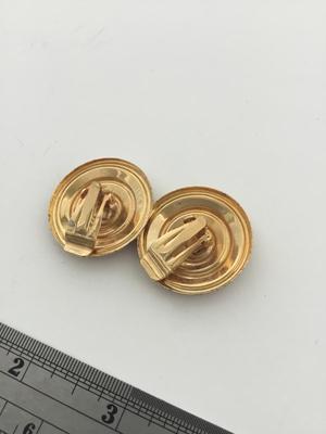 Gold tone red round clip on earrings