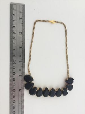 Gold tone unmarked black choker necklace