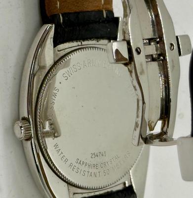 Sale Photo Thumbnail #27: With black leather band.  Sapphire Crystal. Not running, most likely just needs a new battery. Minor scratches and wear marks on the case.