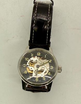 Sale Photo Thumbnail #3: Swiss made, stainless steel back.  Black leather band, luminous hands.  Manual winding, tested, runs as expected.  Good condition, includes wood and felt storage box.