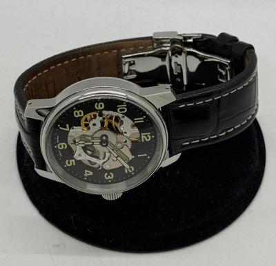 Sale Photo Thumbnail #5: Swiss made, stainless steel back.  Black leather band, luminous hands.  Manual winding, tested, runs as expected.  Good condition, includes wood and felt storage box.