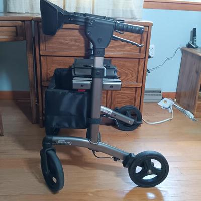 LOT 143: Triumph Escape Rollator Foldable Walker with Seat, White Wicker Wall Cabinet & Chrome Shoe Rack