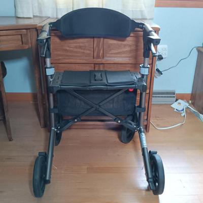 LOT 143: Triumph Escape Rollator Foldable Walker with Seat, White Wicker Wall Cabinet & Chrome Shoe Rack