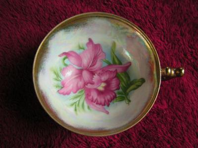 Vintage Norcrest fine china footed teacup & saucer, hand painted w/gold trim