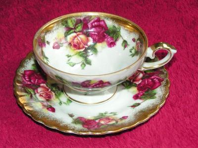 Vintage Royal Sealy China (Japan), footed teacup & saucer. Elegantly painted